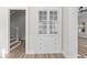 Hallway cabinet with glass doors and drawers for stylish storage at 1429 Brookside Pkwy N Dr, Indianapolis, IN 46201