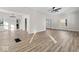 Bright and airy living room with luxury vinyl floors, featuring a ceiling fan at 1429 Brookside Pkwy N Dr, Indianapolis, IN 46201