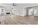 Open-concept living area with modern floors and abundant natural light at 1429 Brookside Pkwy N Dr, Indianapolis, IN 46201
