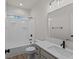 Clean bathroom, featuring a bathtub, shower, and modern vanity at 4996 Hummingbird Dr, Brownsburg, IN 46112
