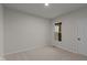 Spacious bedroom with window and neutral wall colors at 4996 Hummingbird Dr, Brownsburg, IN 46112