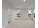 Bright bedroom with windows and carpet flooring at 4996 Hummingbird Dr, Brownsburg, IN 46112