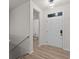 Bright entryway with modern flooring and powder room at 4996 Hummingbird Dr, Brownsburg, IN 46112