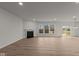 Spacious Gathering room with fireplace and backyard access at 4996 Hummingbird Dr, Brownsburg, IN 46112