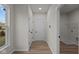 Bright laundry room with washer and dryer hookups, and built-in shelving at 4996 Hummingbird Dr, Brownsburg, IN 46112
