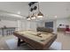 Finished basement with a pool table and mounted tv, perfect for entertaining at 1433 Chatham Hills Blvd, Westfield, IN 46074