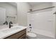 Bathroom features a tub/shower combo, toilet, and stylish vanity with black hardware at 1433 Chatham Hills Blvd, Westfield, IN 46074