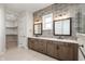 Modern bathroom with dual sinks, custom tile work, and walk in closet at 1433 Chatham Hills Blvd, Westfield, IN 46074