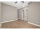 Neutral bedroom offers hardwood floors, recessed lighting, and entryways to other rooms at 1433 Chatham Hills Blvd, Westfield, IN 46074