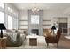 Cozy living room featuring a fireplace, plush seating, and stylish decor at 1433 Chatham Hills Blvd, Westfield, IN 46074