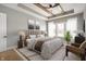 Staged main bedroom featuring a large bed, lamps, and curtains at 1433 Chatham Hills Blvd, Westfield, IN 46074