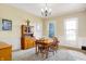 Bright dining room featuring hardwood floors and built-in hutch at 7178 Lockford N, Avon, IN 46123