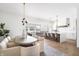 Spacious open-concept kitchen and dining area with hardwood floors and plenty of natural light at 11896 Spring Mill Rd, Carmel, IN 46032
