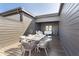 Spacious outdoor patio with dining and seating areas for comfortable entertaining at 11896 Spring Mill Rd, Carmel, IN 46032