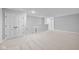 Finished basement features neutral carpet, a closet, and neutral paint at 3537 Wrangler Dr, Bargersville, IN 46106