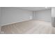 Finished basement features neutral carpet and neutral paint at 3537 Wrangler Dr, Bargersville, IN 46106