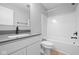 Modern bathroom featuring a sink, grey countertop, matte black fixtures, and a tub with shower at 3537 Wrangler Dr, Bargersville, IN 46106