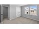 Bedroom features neutral carpet, a closet, a window, and neutral paint at 3537 Wrangler Dr, Bargersville, IN 46106