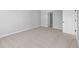 Bedroom featuring neutral carpeting and an open doorway to an attached bathroom at 3537 Wrangler Dr, Bargersville, IN 46106