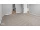 Bedroom featuring neutral carpeting and doorways leading to an attached bathroom and hallway at 3537 Wrangler Dr, Bargersville, IN 46106