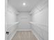 Walk-in closet featuring neutral carpeting and wire shelving units at 3537 Wrangler Dr, Bargersville, IN 46106