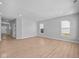 Expansive living room with modern flooring, recessed lighting, and abundant natural light at 3537 Wrangler Dr, Bargersville, IN 46106
