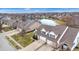 Aerial view showcases the home's location, near a pond, in a well-planned residential community at 1463 Hamilton Dr, Greenwood, IN 46143