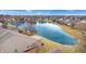 Aerial view of pond in residential area with manicured lawns at 1463 Hamilton Dr, Greenwood, IN 46143