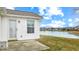 View of the backyard and pond from the patio door offers scenic view and outdoor accessibility at 1463 Hamilton Dr, Greenwood, IN 46143