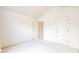 Spacious bedroom with neutral carpet, baseboards, and a view of the hallway at 1463 Hamilton Dr, Greenwood, IN 46143