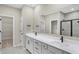 Stylish bathroom with double sink vanity, modern fixtures, and tile flooring at 18425 Depoe Ln, Westfield, IN 46074