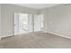 Bedroom features neutral carpet, paint and doors to an on-suite bathroom at 18425 Depoe Ln, Westfield, IN 46074