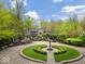 Breathtaking aerial view of luxurious home with circular drive and lavish greenery at 9468 Sullivan Pl, Zionsville, IN 46077
