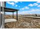 This backyard features a covered patio with views of the surrounding landscape at 20378 Hudson Bay Ln, Westfield, IN 46074