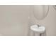 Bathroom featuring pedestal sink and oval mirror at 20378 Hudson Bay Ln, Westfield, IN 46074