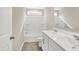 This bathroom features a double vanity, neutral walls, and a tub with shower at 20378 Hudson Bay Ln, Westfield, IN 46074