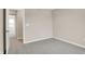 This bedroom features neutral walls, plush carpet, and doorways to other rooms at 20378 Hudson Bay Ln, Westfield, IN 46074