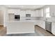 Modern kitchen showcases sleek cabinetry, stainless steel appliances, and hardwood floors at 20378 Hudson Bay Ln, Westfield, IN 46074