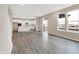 Bright, open-concept living area with hardwood floors and modern kitchen features at 20378 Hudson Bay Ln, Westfield, IN 46074