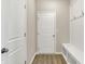 Mudroom with bench seating, hooks, and white trim at 20378 Hudson Bay Ln, Westfield, IN 46074
