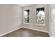 Office space with wood-look floors, neutral paint and large windows providing natural light at 20378 Hudson Bay Ln, Westfield, IN 46074