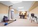 Finished basement with a pool table, punching bag and vintage games at 719 Trent Dr, Greenwood, IN 46143