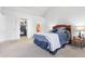 Spacious bedroom features neutral carpet and closet at 719 Trent Dr, Greenwood, IN 46143