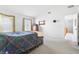 Bright bedroom with vaulted ceiling and large windows, offering plenty of natural light at 719 Trent Dr, Greenwood, IN 46143
