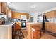 Bright kitchen features wood cabinets, modern appliances, and center island at 719 Trent Dr, Greenwood, IN 46143