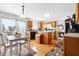 Bright kitchen features wood cabinets, modern appliances, and eat-in area at 719 Trent Dr, Greenwood, IN 46143
