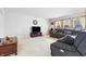 Cozy living room showcasing plush seating, neutral walls, and a warm ambiance at 719 Trent Dr, Greenwood, IN 46143