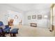Bright living room boasts neutral carpet, ample natural light, and tasteful decor at 719 Trent Dr, Greenwood, IN 46143