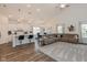 Open concept living room showcases an eat-in kitchen, dining area, and comfortable seating area at 8118 Ambrosia Ln, Pendleton, IN 46064