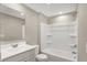 Bathroom with single sink vanity and a shower/tub combo at 413 Onset Way, Westfield, IN 46074